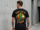 Sassy 'Don't Be a Prick' funny cactus graphic t-shirt.